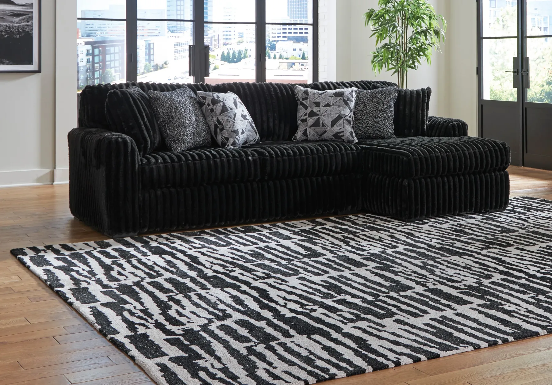 Fashion American Furniture Galleries Midnight-Madness 2-Piece Sectional Sofa with Chaise